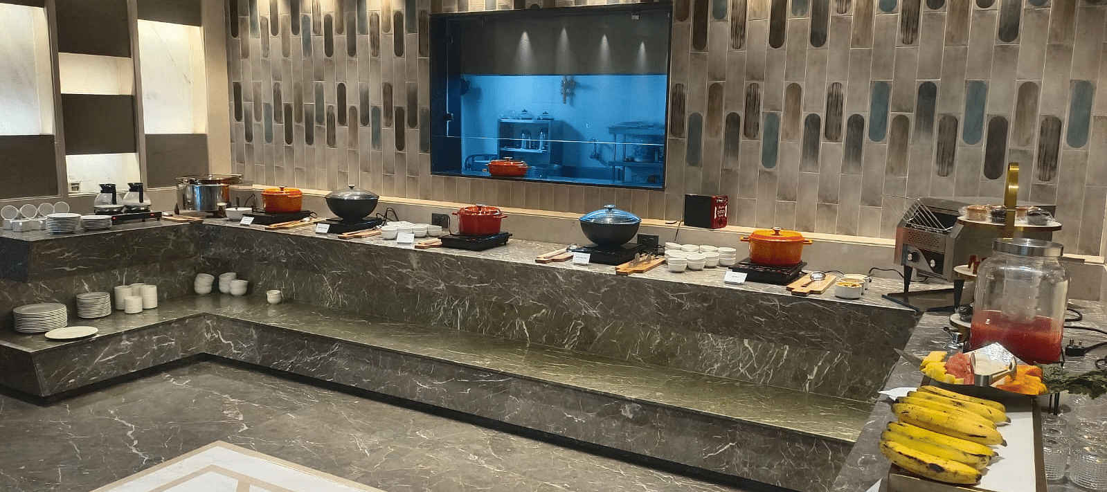 A vibrant buffet spread featuring a variety of dishes, desserts, and fresh fruits at  A vibrant buffet spread featuring a variety of dishes, desserts, and fresh fruits.